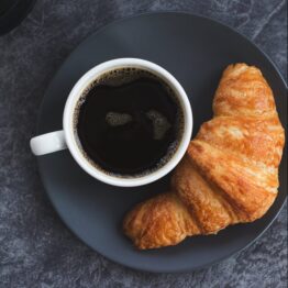 black-coffee-and-a-croissant-scaled-e1596387860408